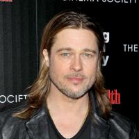 Brad Pitt, sem Jolie e todo de preto, vai à pré-estreia de 'Killing Them Softly'