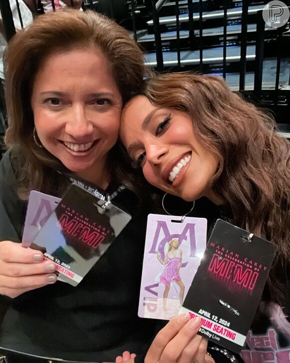 Anitta assiste show de Mariah Carey com a tia e exibe novo cabelo