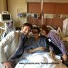 Bradley Cooper posa com Celeste Corcoran, uma das vítimas que visitou em um dos hospitais da cidade