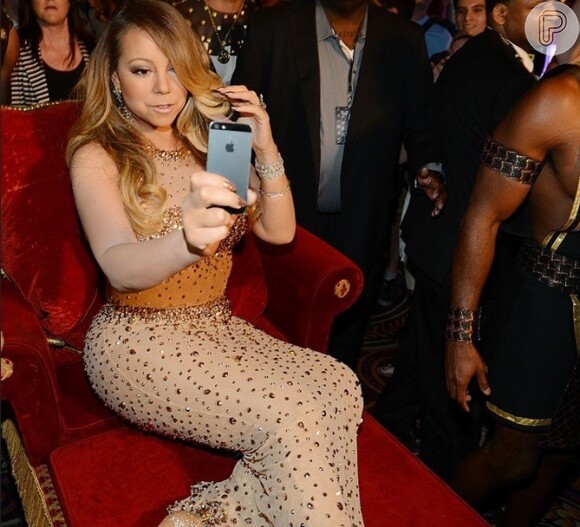 Com um look transparente, Mariah Carey apresentou seu novo single, 'Infinity', em um evento no hotel Caesars Palace, em Las Vegas, nesta segunda-feira, 27 de abril de 2015