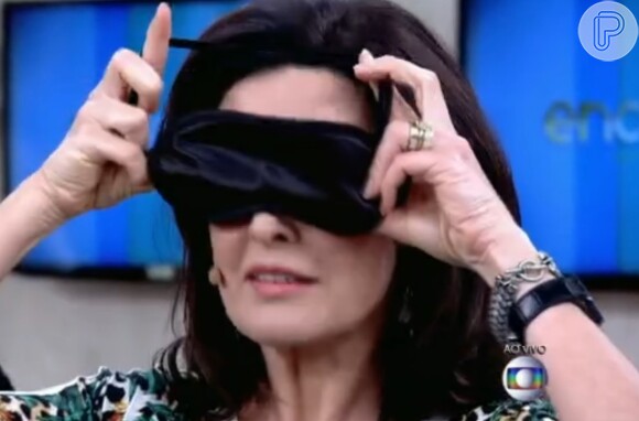 Fátima Bernardes usava uma venda nos olhos quando pediu a uma deficiente visual para avisá-la se houve algum bicho pela frente