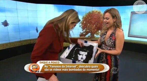 Eliana encerrou a entrevista dando uma camisa de Elvis Presley de presente para Rachel Sheherazade