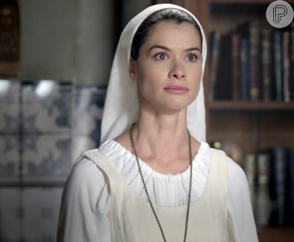 Lívia (Alinne Moraes) se recusa a voltar para o convento sem ter certeza de que a mãe está bem, na novela 'Além do Tempo'