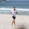 Cauã Reymond foi clicado na tarde desta terça-feira, 28 de julho de 2015, enquanto corria na praia da Barra da Tijuca, Zona Oeste do Rio de Janeiro