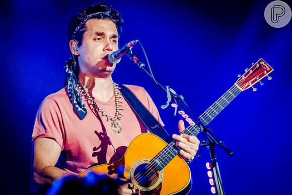 John Mayer acalentou os corações apaixonados da Cidade do Rock por mais de uma hora em sua primeira vinda ao Brasil. O cantor já havia se apresentado em São Paulo