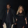 Kim Kardashian e Kanye West chegam ao desfile da Givenchy na semana de moda de Paris, em 29 de setembro de 2013