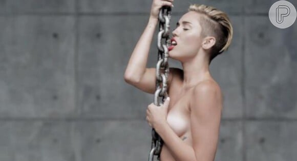 Outubro 2013 - Miley lança o clipe de 'Wrecking Ball' pendurada em uma bola de demolição, lambendo um martelo e realizando poses e cenas ousadas, mostrando que o VMA foi apenas o início