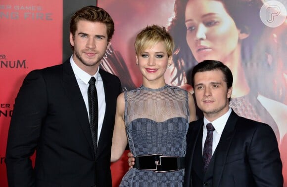 A atriz Jennifer Lawrence estrela o longa 'Jogos Vorazes' ao lado de Liam Hemsworth e Josh Hutcherson