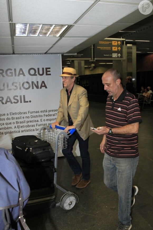  
Hugh Laurie, o protagonista do seriado 'House', desembarcou no Brasil na tarde desta terça-feira, 18 de março de 2014