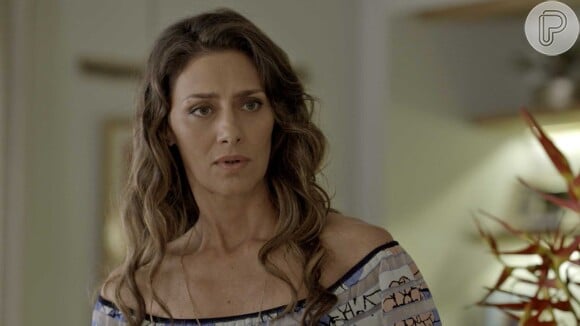 Joyce (Maria Fernanda Cândido) ficará com o rosto cheio de manchas depois de beber o suco adulterado