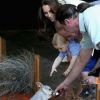 Kate Middleton e príncipe William seguraram o príncipe George Alexander Louis para que ele não pegasse o roedor