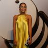 Taís Araújo usou um vestido amarelo do estilista André Lima na festa de lançamento da novela 'G3R4ÇÃO BR4S1L', em 29 de abril de 2014