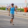 Reynaldo Gianecchini corre na orla da praia de Ipanema, na Zona Sul do Rio de Janeiro, em 1º de maio de 2014