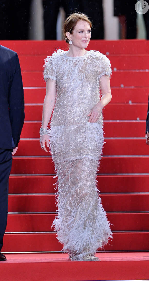 Julianne Moore também não esteve na premiação durante o Festival de Cannes 2014, mas apostou nas franjas em um vestido com particularidades brilhantes durante a premiére do filme 'Mapas para as Estrelas'