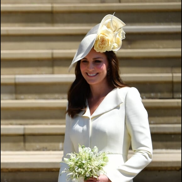 Kate Middleton usa vestido-casaco Alexander McQueen pela quarta vez, no casamento do príncipe Harry com Meghan Markle, em 19 de maio de 2018