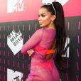 Anitta usou rabo de cavalo alto e deixou o top e a calcinha asa-delta à mostra no look do MTV Millennial Awards Brasil 2018, realizado no Citibank Hall, em São Paulo, na noite desta quarta-feira, 23 de maio de 2018