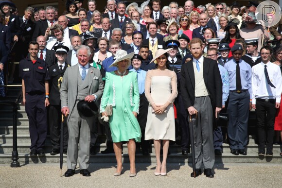 Meghan Markle posou com o marido, Príncipe Harry, o sogro, Príncipe Charles e Camilla Parker em evento