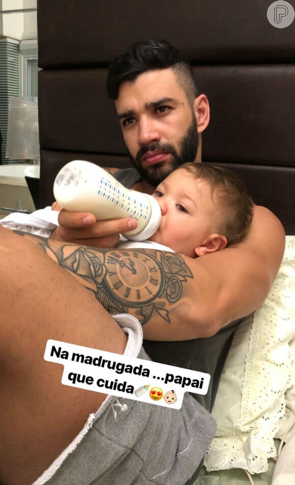 Andressa Suita mostrou o marido, Gusttavo Lima, dando mamadeira para o filho, Gabriel, na madrugada desta sexta-feira, 8 de junho de 2018