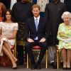 Meghan Markle usa look rosé Prada para evento com Harry e rainha Elizabeth II nesta terça-feira, dia 26 de junho de 2018