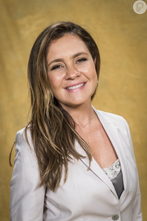 Laureta (Adriana Esteves) pede R$ 300 mil para não entregar negócios supostamente ilegais de Roberval (Fabricio Boliveira) na novela 'Segundo Sol'
