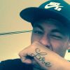 Neymar mostra sua nova tatuagem: a palavra 'Love' (amor, em português), em 22 de agosto de 2014