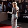 Rita Ora foi escoltada por um segurança no tapete vermelho do GQ Men Of The Year Awards por causa do valor de suas joias 