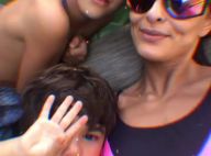 Com look neon, Juliana Paes filma filho caçula, Antônio, cantando. Vídeo!