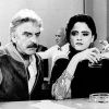 Hugo Carvana e Marieta Severo atuaram juntos no filme 'Vai Trabalhar Vagabundo 2', em 1991