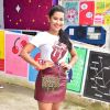 Looks dos famosos do Lollapalooza: Thaynara OG apostou no animal print nos acessórios, saia de couro vinho e t-shirt divertida em visual fashionista
