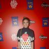 Looks dos famosos do Lollapalooza: Carol Sampaio optou por vestido de poá com estampa de caju e tênis no estilo comfy