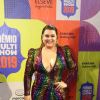 Preta Gil escolheu um vestido arco-íris para apresentar uma das categorias do Prêmio Multishow 2019