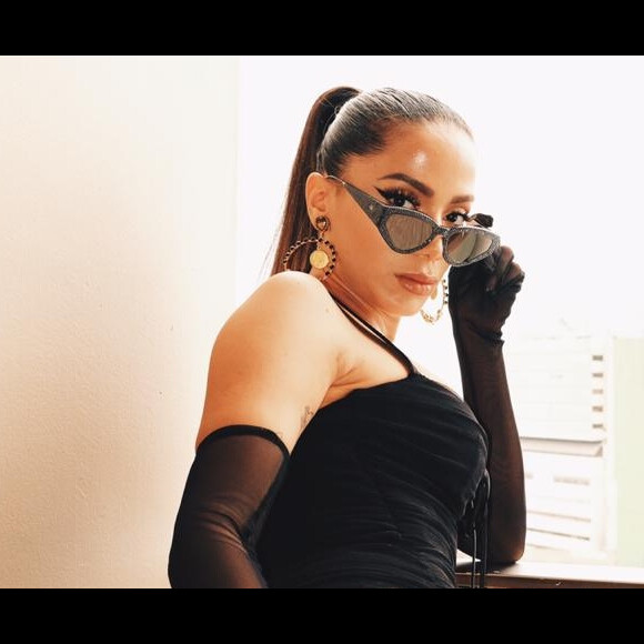 Anitta responde internauta que criticou seu look na final da Libertadores, em 23 de novembro de 2019