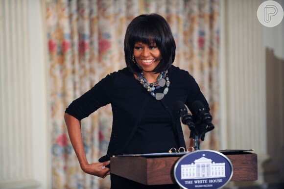 Michelle posa durante workshop com jovens no primeiro compromisso oficial de 2013, na sala de jantar da Casa Branca, em Washington, em fevereiro de 2013