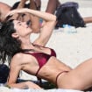 Julianne Trevisol renova bronzeado de biquíni e exibe barriga sarada em praia. Fotos!