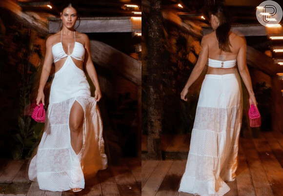 Vestido branco de Andressa Suita em detalhes frente e verso: cintura e costas vazadas, decote e fendas deixam o look fresquinho para os dias quentes
