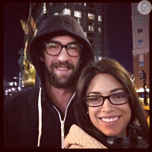 Michael Phelps e a namorada, Nicole Michele, curtem uma noite à sós