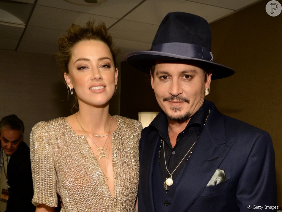 Johnny Depp e Amber Heard se conheceram durante as gravações de 'Diário de Um Jornalista Bêbado'