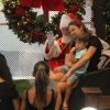 Leticia Birkheuer levou o filho, João Guilherme, para tirar fotos com Papai Noel em um shopping da Zona Sul, no Rio de Janeiro, nesta sexta-feira, 12 de dezembro de 2014