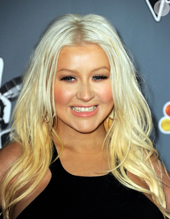 Christina Aguilera mostrou preocupação com as últimas polêmicas envolvendo Justin Bieber e decidiu dar conselhos para o astro em entrevista para o site 'Hollyscoop', nesta quinta-feira, 21 de março de 2013