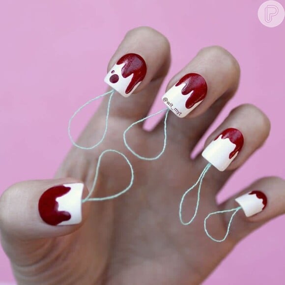 Unhas decoradas com tema absorvente interno: essa curiosa nail art tem até aplicação de fios