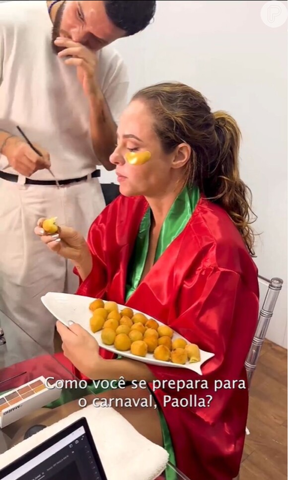 Paolla Oliveira foi filmada comendo salgadinhos antes do desfile