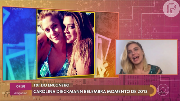 Carolina Dieckmann foi surprendida por Patrícia Poeta com uma foto dela e Preta Gil.
