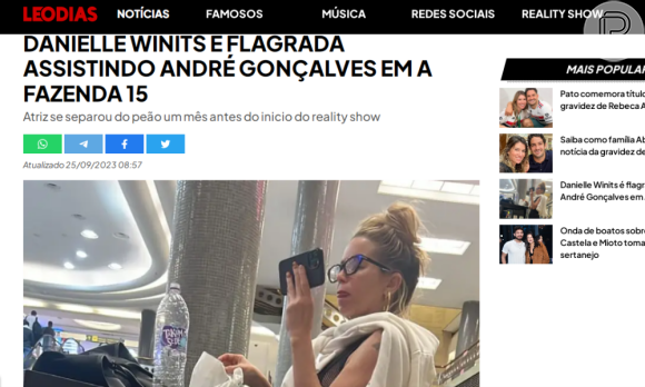 Danielle Winits foi flagrada em um aeroporto e leitor de Leo Dias garante que ela estava assistindo a cenas de André Gonçalves em 'A Fazenda'