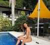 Web exalta Isis Valverde após atriz divulgar fotos de biquíni na piscina