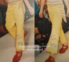 Marina Ruy Barbosa criança: atriz usa blusa de ombro só listrada, calça amarela e sandália vermelha da Melissa para desfilar nas passarelas com look excêntrico