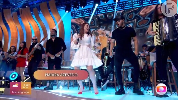 Voz rouca de Naiara Azevedo no 'Encontro' fez a web zombar da cantora sertaneja: 'Quando eu tiro o fone de ouvido, é assim que eu canto também'
