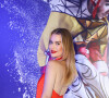 Vestido vermelho e costas nuas: a aposta de Fernanda Keulla para show do Cirque du Soleil