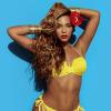 Beyoncé posa com um biquíni amarelo para o catálogo da H&M