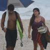 Acompanhada do novo namorado, Hugo Moura, Deborah Secco foi à praia, nesta sexta-feira, 27 de março de 2015, no Rio de Janeiro