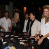 Klebber Toledo e Di Ferrero se divertem em evento da Jack Daniel's, no Rio. Ellen Jabour e Juliano Cazarré também marcaram presença
